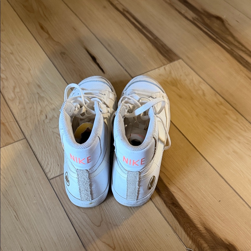 White Nike Sneakers with Pink Details